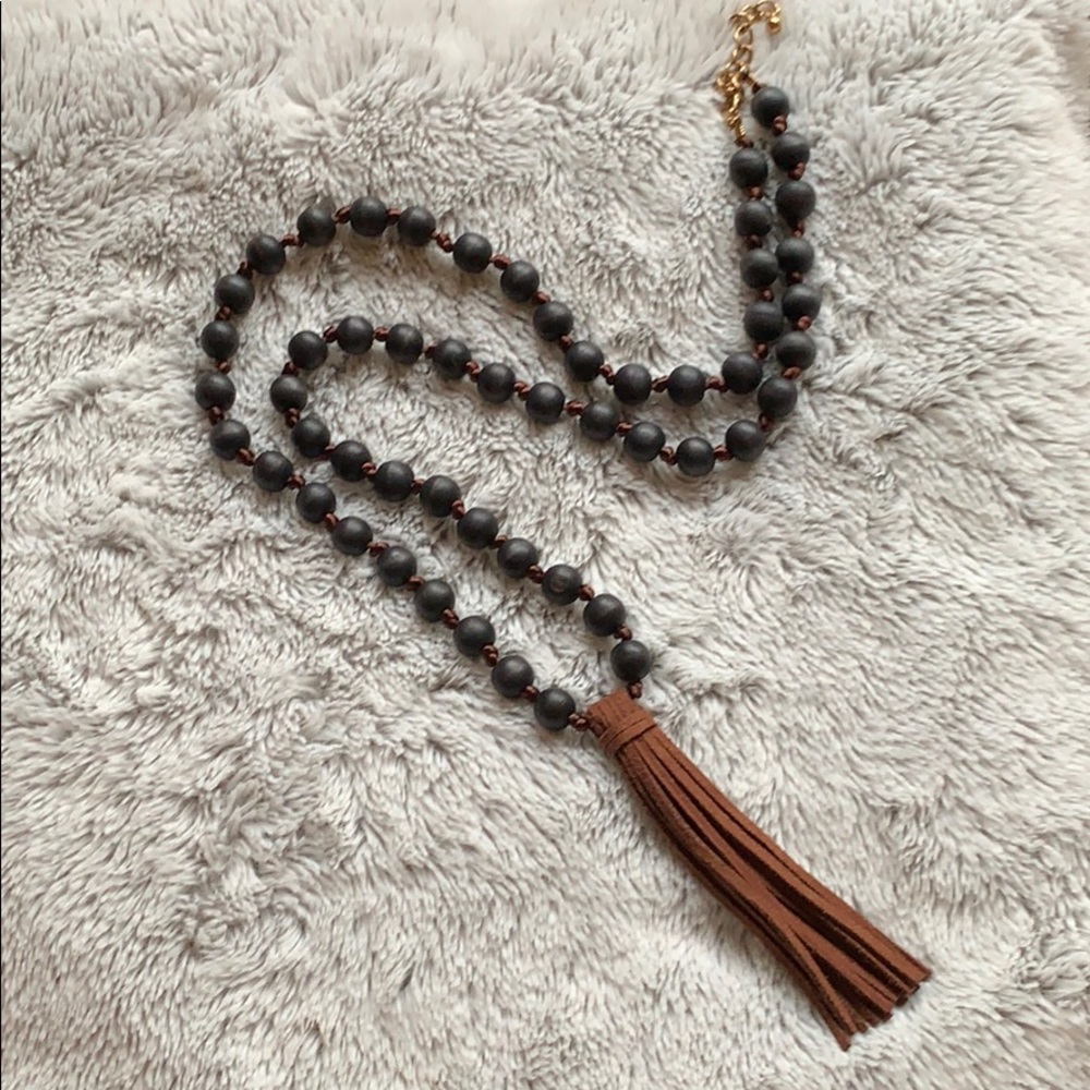 Black bead and leather tassel long necklace
